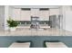 Bright kitchen featuring granite countertops, stainless steel appliances, and a stylish breakfast bar at 4235 Scharite St, Charleston, SC 29414