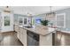 Open concept kitchen with granite counters, stainless appliances, and view of living spaces at 4235 Scharite St, Charleston, SC 29414