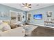 Cozy living area features hardwood floors and a flatscreen television at 4235 Scharite St, Charleston, SC 29414