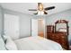 This well-lit bedroom features neutral walls, a ceiling fan, and a dresser with decorative mirror at 428 Cabrill Dr, Charleston, SC 29414