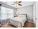 Well-lit bedroom features neutral carpet, a ceiling fan, and natural light from the window at 428 Cabrill Dr, Charleston, SC 29414