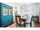 Stylish dining room featuring a blue hutch, modern lighting, and comfortable seating at 428 Cabrill Dr, Charleston, SC 29414