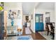 Inviting entryway with hardwood floors, blue accents, and a view of the kitchen at 428 Cabrill Dr, Charleston, SC 29414