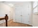 Upstairs hallway showing a closet door and natural light from a window at 428 Cabrill Dr, Charleston, SC 29414