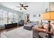 Comfortable living room with ample seating, natural light, and a view into the kitchen and backyard at 428 Cabrill Dr, Charleston, SC 29414