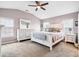 Spacious main bedroom features neutral carpet, tray ceilings, ceiling fan and traditional decor at 428 Cabrill Dr, Charleston, SC 29414
