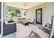 Inviting screened porch with stylish furniture, perfect for outdoor relaxation at 428 Cabrill Dr, Charleston, SC 29414