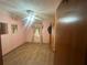 Cozy bedroom with tile floors, floral wallpaper, and a ceiling fan at 4462 Hardwood St, Ladson, SC 29456