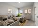 Cozy ' bedroom with twin beds, neutral tones, and cheerful decor for a welcoming space at 459 White Magnolia St, Moncks Corner, SC 29461