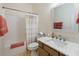 Well-lit bathroom featuring a shower-tub, neutral colored walls, and an elegant single sink vanity with a white countertop at 465 Blue Dragonfly Dr, Charleston, SC 29414