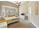 Bright, spacious bedroom with high ceilings, natural light, and cozy decor at 465 Blue Dragonfly Dr, Charleston, SC 29414