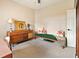 Cozy bedroom with neutral walls, carpet, and stylish mid-century modern furniture at 465 Blue Dragonfly Dr, Charleston, SC 29414
