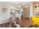 Elegant dining room featuring hardwood floors, stylish decor, and ample natural light at 465 Blue Dragonfly Dr, Charleston, SC 29414