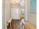 Inviting entryway with hardwood floors, natural light, and decorative furnishings at 465 Blue Dragonfly Dr, Charleston, SC 29414