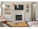 Spacious living room with fireplace and shelving perfect for entertaining at 465 Blue Dragonfly Dr, Charleston, SC 29414