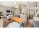 Inviting living space featuring a modern kitchen, cozy living room, and hardwood floors at 465 Blue Dragonfly Dr, Charleston, SC 29414