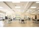 Bright and welcoming lobby area with tables and chairs for guests or students at 465 Blue Dragonfly Dr, Charleston, SC 29414