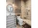Elegant bathroom with a modern vanity, mirror, toilet, and a glass-enclosed shower for a spa-like experience at 4855 Retriever Rd, Wadmalaw Island, SC 29487