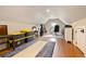 A spacious bonus room offers flex space with hardwood floors and neutral paint at 4855 Retriever Rd, Wadmalaw Island, SC 29487