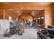 Spacious garage with wooden interior, featuring ample storage and room for equipment at 4855 Retriever Rd, Wadmalaw Island, SC 29487