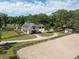 Aerial image of a beautiful farm with fenced pastures and a well-maintained equestrian area at 4855 Retriever Rd, Wadmalaw Island, SC 29487