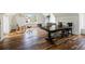 Bright artist's studio with hardwood floors, easel, and plenty of natural light at 4855 Retriever Rd, Wadmalaw Island, SC 29487