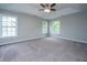 Bedroom featuring plush carpet, recessed lighting, and multiple windows at 493 Nelliefield Trl, Wando, SC 29492