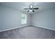 Neutral bedroom featuring a ceiling fan, gray carpet, and a single window with natural light at 493 Nelliefield Trl, Wando, SC 29492