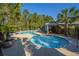 Bright and inviting community pool with plenty of lounge chairs and a covered area at 493 Nelliefield Trl, Wando, SC 29492