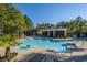 Beautiful community pool featuring ample seating and a covered pavilion for shaded relaxation at 493 Nelliefield Trl, Wando, SC 29492