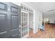 Inviting foyer features wood floors and an open view to the living spaces at 493 Nelliefield Trl, Wando, SC 29492