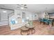 Spacious living room featuring stairs, hardwood floors, and an open design with lots of natural light at 493 Nelliefield Trl, Wando, SC 29492