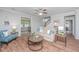 Comfortable living room with wood floors and a relaxing atmosphere at 493 Nelliefield Trl, Wando, SC 29492