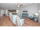 Open concept living area with a view of the kitchen and dining space at 493 Nelliefield Trl, Wando, SC 29492