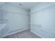 Walk-in closet featuring ample wire shelving for storage and organization at 493 Nelliefield Trl, Wando, SC 29492