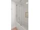 Bathroom featuring a glass shower door and white subway tile at 5 Smith St, Charleston, SC 29401