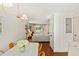Open dining and living area features white walls, hardwood floors and view to the living room at 5 Smith St, Charleston, SC 29401