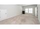 Bedroom with neutral carpet and walls, window, and door, ready to be personalized at 524 Richfield Way, Summerville, SC 29486