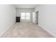 Bedroom with neutral walls and carpet, featuring window and closet door, making it cozy at 524 Richfield Way, Summerville, SC 29486
