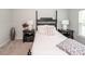 Well-lit bedroom features plush carpet, a decorative headboard, and matching bedside tables at 524 Richfield Way, Summerville, SC 29486