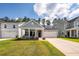Attractive single-Gathering home with a well-manicured lawn and a two-car garage at 524 Richfield Way, Summerville, SC 29486