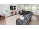 Cozy living room featuring a comfortable sofa, stylish decor, and a welcoming atmosphere at 524 Richfield Way, Summerville, SC 29486