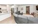 Living room is open to the kitchen and features stainless appliances and hardwood floors at 524 Richfield Way, Summerville, SC 29486