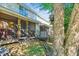 Exterior home view shows screened porch and exterior AC units with landscaping at 525 Tayrn Dr, Wando, SC 29492