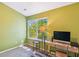 Sun-lit bedroom with a large window, modern desk, and contemporary decor at 525 Tayrn Dr, Wando, SC 29492