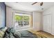 Bedroom featuring a large window with natural light and street view at 525 Tayrn Dr, Wando, SC 29492