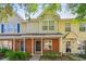 Charming townhouse exterior featuring brick accents and a welcoming entrance at 525 Tayrn Dr, Wando, SC 29492