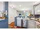 Open kitchen with stainless steel dishwasher, and modern lighting at 525 Tayrn Dr, Wando, SC 29492