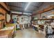 Organized barn interior with utility sink, storage solutions, and ample space for various equipment and supplies at 5348 Mccullough Dam Rd, Wadmalaw Island, SC 29487