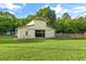 Spacious barn has an open design with room for horses or livestock on lush green pasture at 5348 Mccullough Dam Rd, Wadmalaw Island, SC 29487